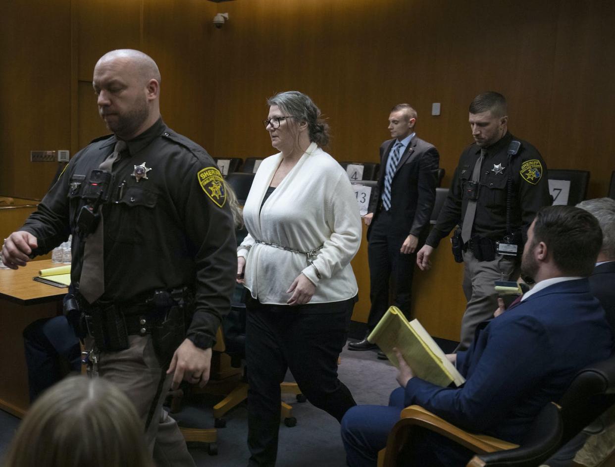 Jennifer Crumbley enters the Michigan courtroom during her trial on involuntary manslaughter charges on Feb. 5, 2024. <a href="https://www.gettyimages.com/detail/news-photo/jennifer-crumbley-the-mother-of-oxford-school-shooter-ethan-news-photo/1981068568?adppopup=true" rel="nofollow noopener" target="_blank" data-ylk="slk:Bill Pugliano/Getty Images;elm:context_link;itc:0;sec:content-canvas" class="link ">Bill Pugliano/Getty Images</a>