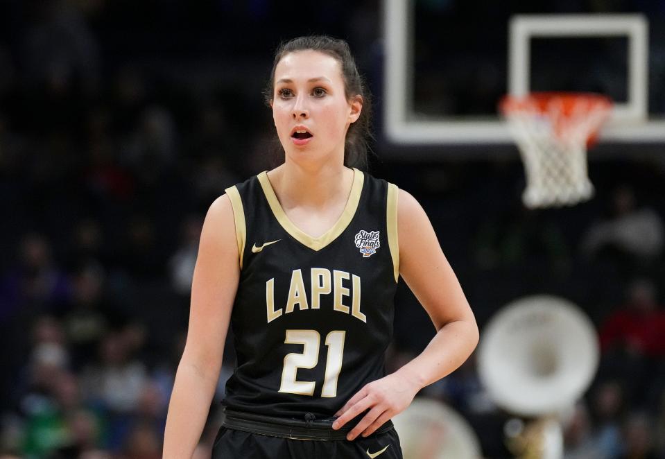 Lapel Bulldog Madelyn Poynter (21) walks the court on Saturday, Feb. 25, 2023, during the IHSAA Class 2A championship game at Gainbridge Fieldhouse in Indianapolis.