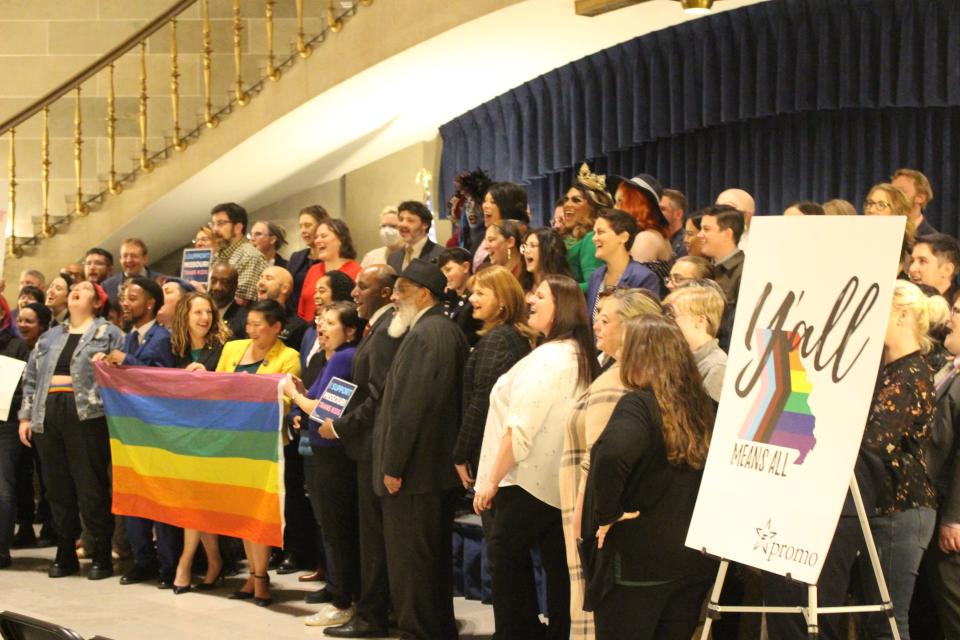 Members and advocates of the LGBTQ+ community stand in the Missouri State Capitol rotunda following a press conference in Jefferson City on Jan. 24, 2023. Leaders called on attendees to oppose a slate of bills aimed at transgender youth.