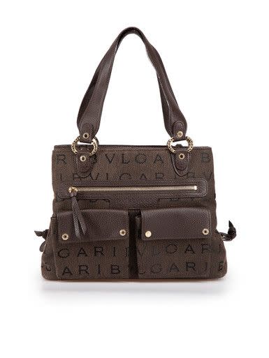 <p><a href="https://go.redirectingat.com?id=74968X1596630&url=https%3A%2F%2Fcsd.shop%2Fproducts%2Fwomen%2Fbags%2Fbvlgari-vintage-brown-monogram-shoulder-bag.html&sref=https%3A%2F%2F" rel="nofollow noopener" target="_blank" data-ylk="slk:Shop Now;elm:context_link;itc:0;sec:content-canvas" class="link ">Shop Now</a></p><p>Vintage Brown Monogram Shoulder Bag</p><p>csd.shop</p><p>$342.00</p>