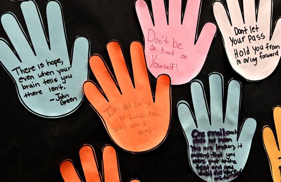 A resident’s sentiment “Im Not Going to Leave the same way I came!!!” is written on a hand cutout inside the library at the Mecklenburg County Juvenile Detention Center on Friday, May 27, 2022. The state is urging commissioners and Sheriff Garry McFadden to reconsider a budget item that proposes closing the center on Spector Drive in Charlotte.