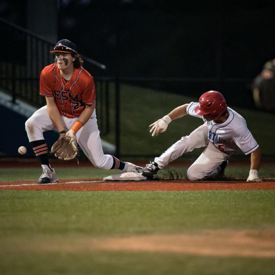 New Hartford's Derek DeFazio slides safely into third base during the semi-finals of the 2023 Section III Class A Baseball Tournament at Onondaga Community College on Saturday, May 27, 2023.