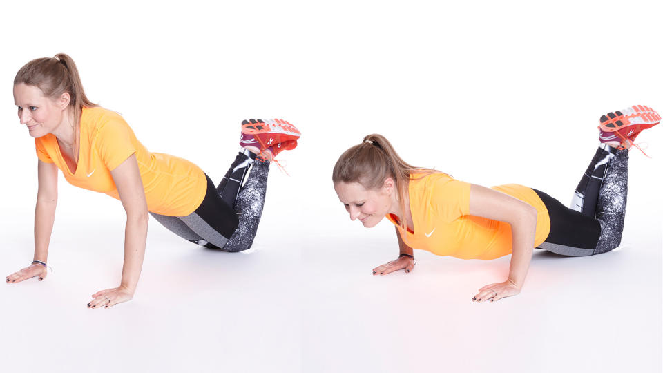 Woman doing a knee push up