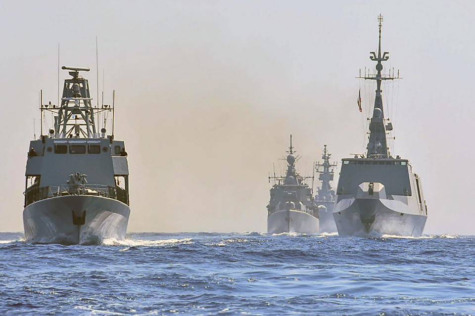 In this photo provided on Monday, Aug. 31, 2020, by the Greek Defense Ministry, worships from Greece, Italy, Cyprus and France, participate in a joint military exercise which was held from 26-28 of August, south of Turkey in eastern Mediterranean sea. Turkey on Monday, Aug. 31, accused Greece of "piracy" and warned it will stand up to Athens' alleged efforts to militarize islands near its coast.(Greek Defense Ministry via AP)