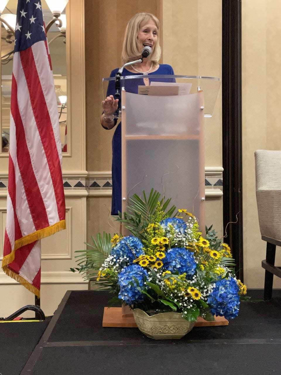 Jeanne Sweeney, founder and CEO of the Above the Board Chamber, addresses audience at a recent luncheon.