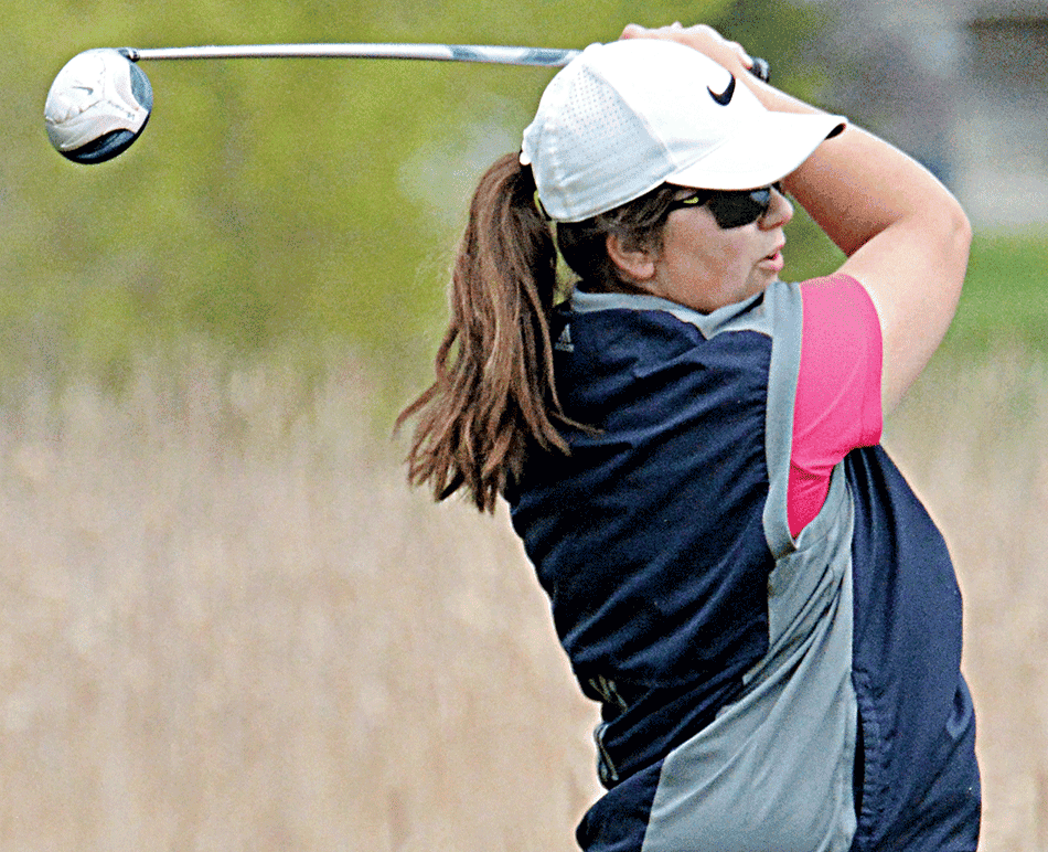 Taylor Dornbusch of Great Plains Lutheran follows through after hitting a tee shot Monday during the 2018 Pre-Region 1B high school boys and golf tournament at Cattail Crossing Golf Course. Dornbusch earned medalist honors in the girls division with a 92.