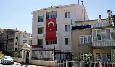 A Turkey's national flag hangs on the facade of a girls dormitory which was sealed by Turkish authorities over alleged links to the followers of U.S. based cleric Fethullah Gulen, who Turkey accused of staging a coup attempt in July, in Ankara, Turkey, August 16, 2016. REUTERS/Umit Bektas