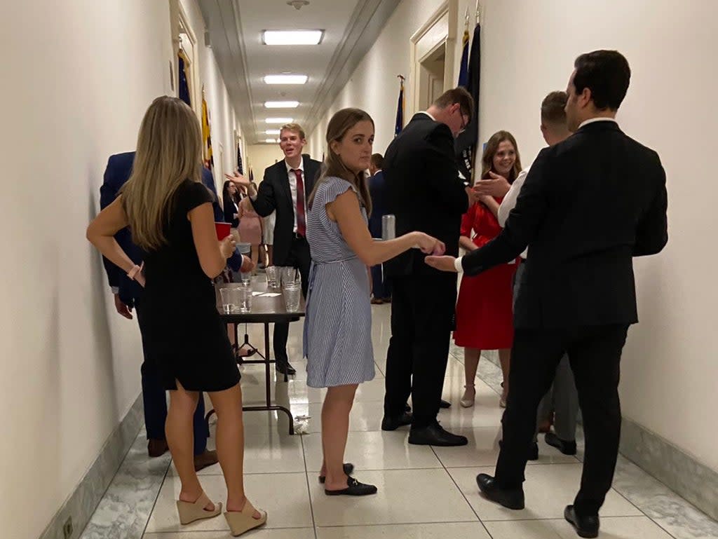 Aaron Fritschner, the Deputy Chief of Staff for Virginia representative Don Beyer, posted images of a group of people gathered in a hallway on Twitter on Thursday (Twitter)