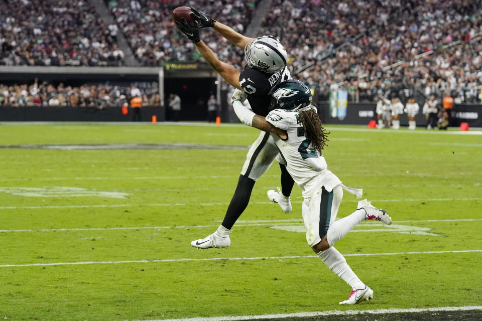 Las Vegas Raiders wide receiver Hunter Renfrow (13) catches a pass over Philadelphia Eagles free safety Avonte Maddox (29) during the second half of an NFL football game, Sunday, Oct. 24, 2021, in Las Vegas. (AP Photo/Rick Scuteri)