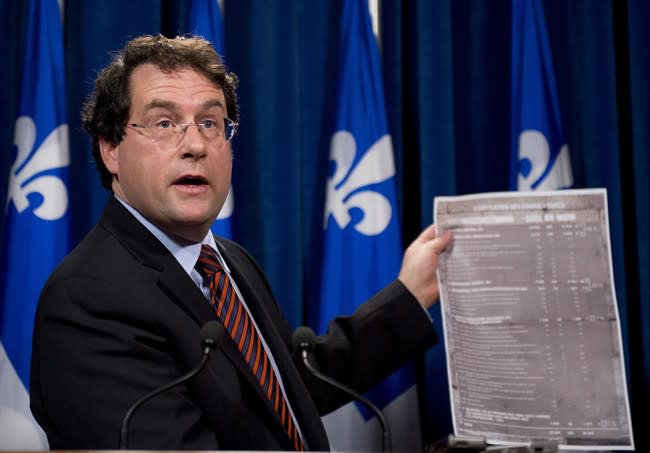 Quebec Minister responsible for Democratic Institutions and Active Citizenship Bernard Drainville outlines a survey on the Quebec charter of values, Tuesday, October 22, 2013 at the legislature in Quebec City. THE CANADIAN PRESS/Jacques Boissinot