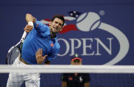 Aug 29, 2016; New York, NY, USA; Novak Djokovic of Serbia serves to Jerzy Janowicz of Poland on day one of the 2016 U.S. Open tennis tournament at USTA Billie Jean King National Tennis Center. Mandatory Credit: Geoff Burke-USA TODAY Sports