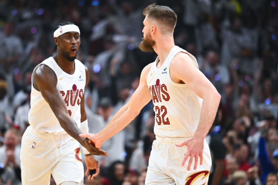 CLEVELAND, OHIO – MAY 11: <a class="link " href="https://sports.yahoo.com/nba/players/5651/" data-i13n="sec:content-canvas;subsec:anchor_text;elm:context_link" data-ylk="slk:Caris LeVert;sec:content-canvas;subsec:anchor_text;elm:context_link;itc:0">Caris LeVert</a> #3 and Dean Wade #32 of the Cleveland Cavaliers react during the first quarter against the Boston Celtics in Game Three of the Eastern Conference Second Round Playoffs at Rocket Mortgage Fieldhouse on May 11, 2024 in Cleveland, Ohio. NOTE TO USER: User expressly acknowledges and agrees that, by downloading and or using this photograph, User is consenting to the terms and conditions of the Getty Images License Agreement. (Photo by Jason Miller/Getty Images)