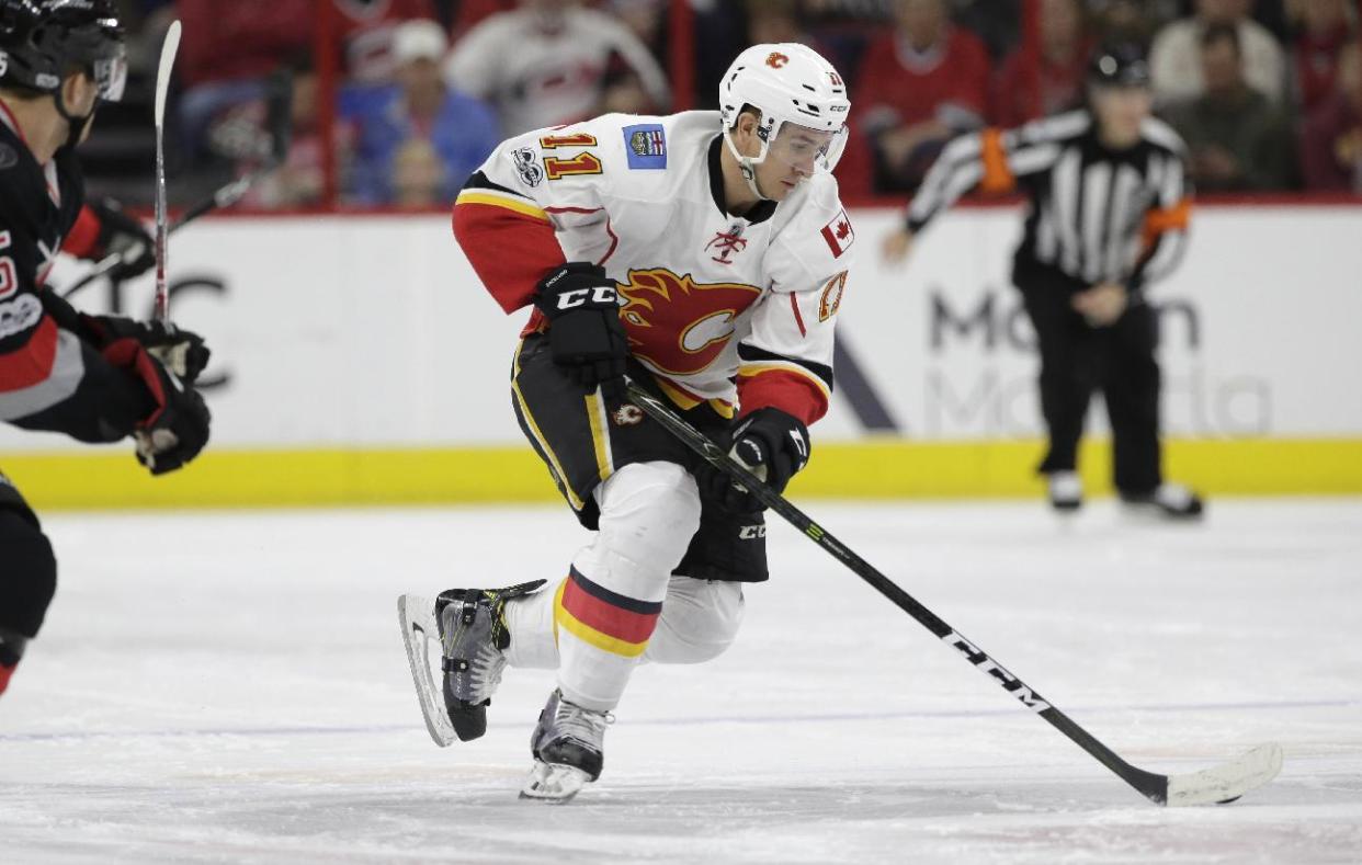 Calgary Flames’ Mikael Backlund (11) skates against the Carolina Hurricanes during the first period of an NHL hockey game in Raleigh, N.C., Sunday, Feb. 26, 2017. (AP Photo/Gerry Broome)