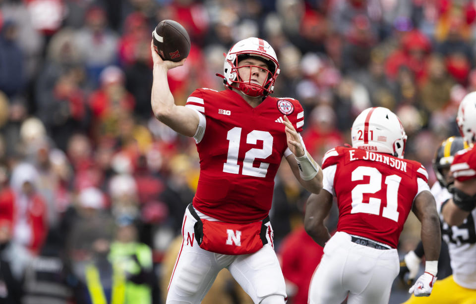 Nebraska quarterback Chubba Purdy (12) passes the ball against Iowa during the first half of an NCAA college football game Friday, Nov. 24, 2023, in Lincoln, Neb. (AP Photo/Rebecca S. Gratz)