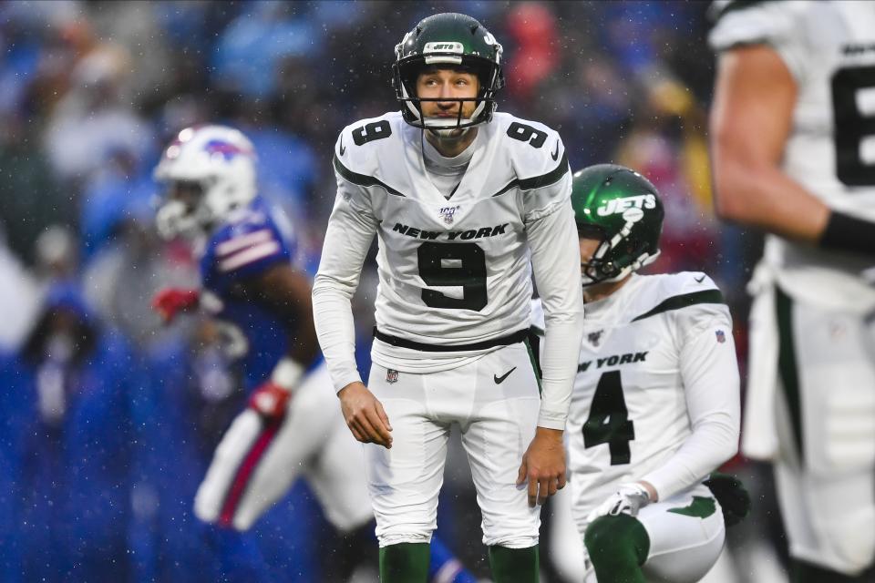 New York Jets kicker Sam Ficken (9) reacts after missing a field goal during the first half of an NFL football game against the Buffalo Bills Sunday, Dec. 29, 2019 in Orchard Park, N.Y. (AP Photo/Adrian Kraus)