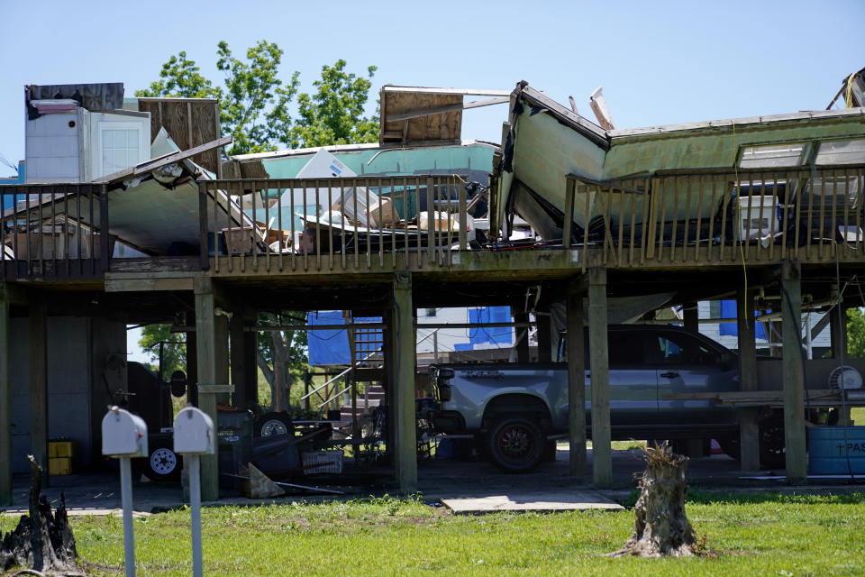 Destruction from Hurricane Ida is seen along Bayou Pointe-au-Chien, La., Thursday, May 26, 2022, nine months after the hurricane ravaged the bayou communities of southern Louisiana. (AP Photo/Gerald Herbert)