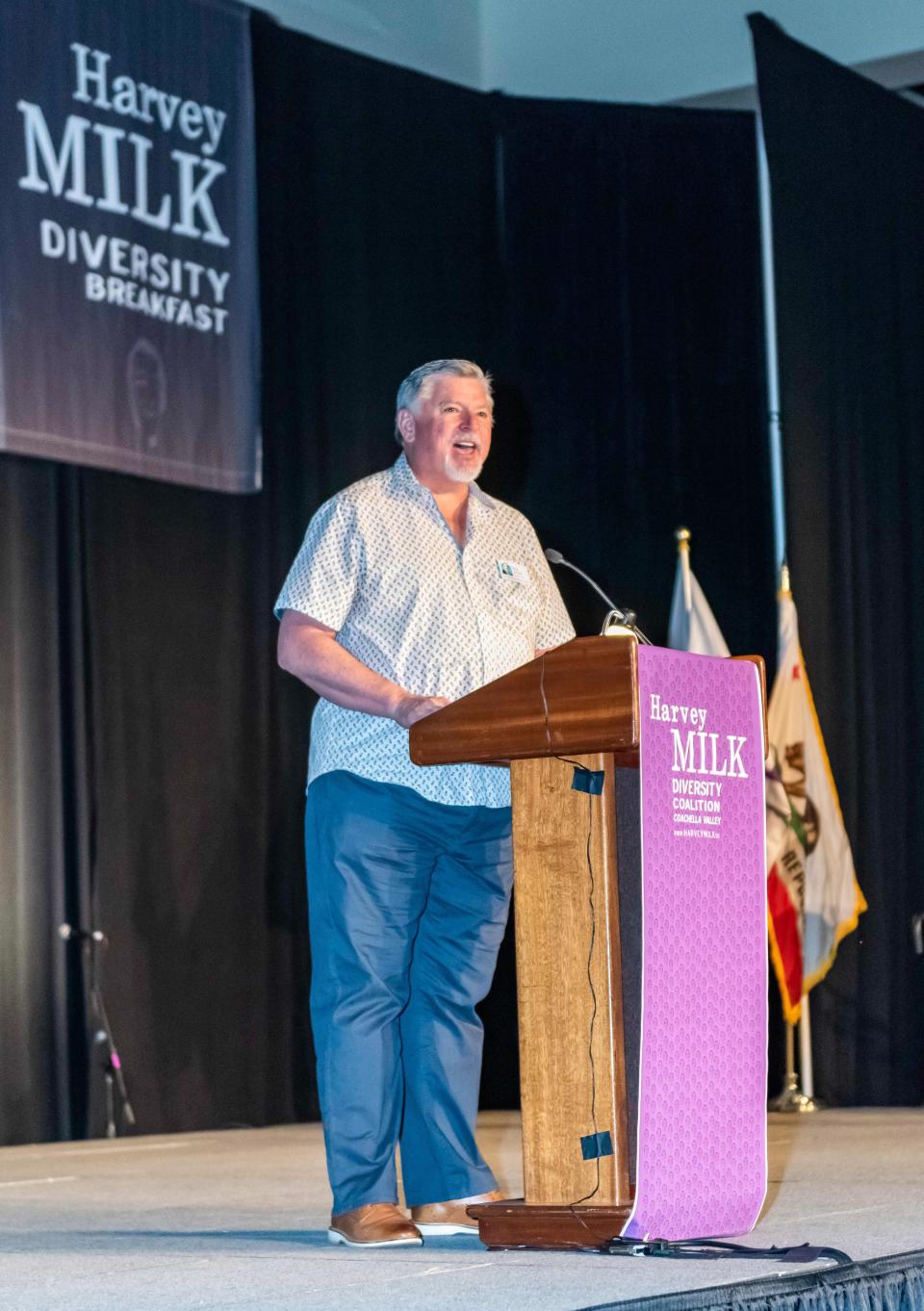 Ron deHarte, founding chair of the Harvey Milk Diversity Breakfast Coalition, addresses the crowd on May 11, 2022.