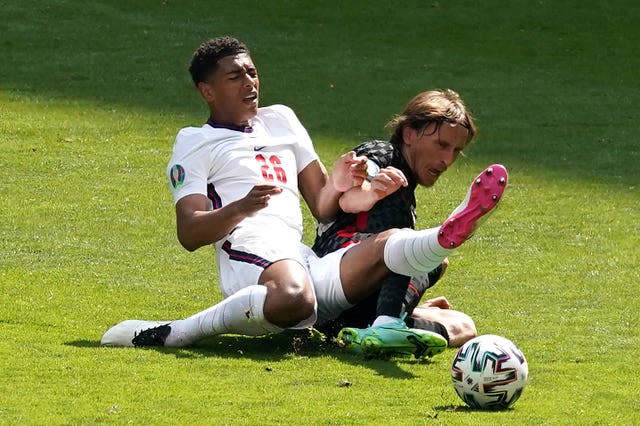 Jude Bellingham, left, challenges Croatia's Luka Modric at Euro 2020