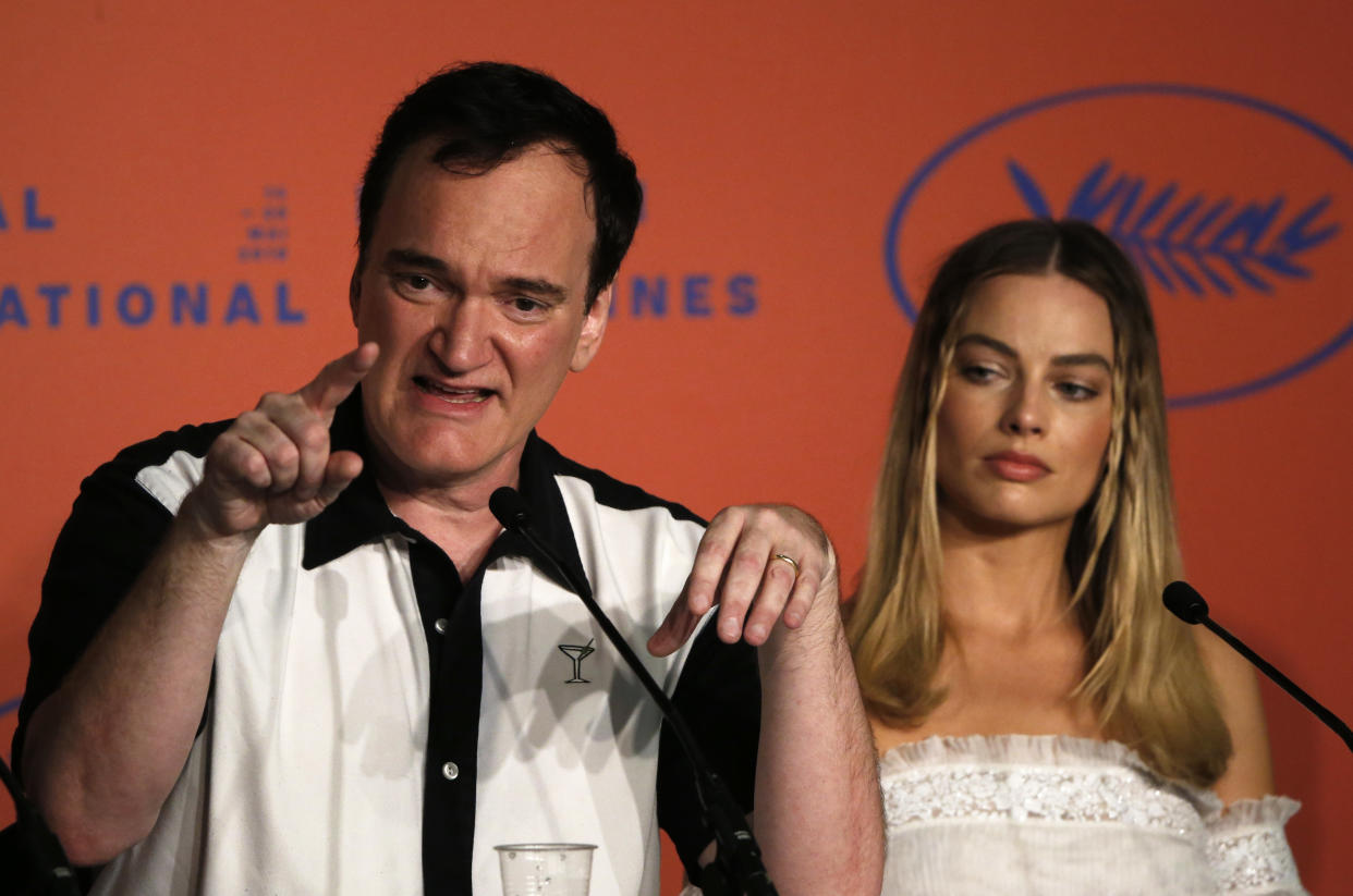 72nd Cannes Film Festival - News conference for the film "Once Upon a Time in Hollywood" in competition - Cannes, France, May 22, 2019. Director Quentin Tarantino and cast member Margot Robbie attend the news conference. REUTERS/Regis Duvignau