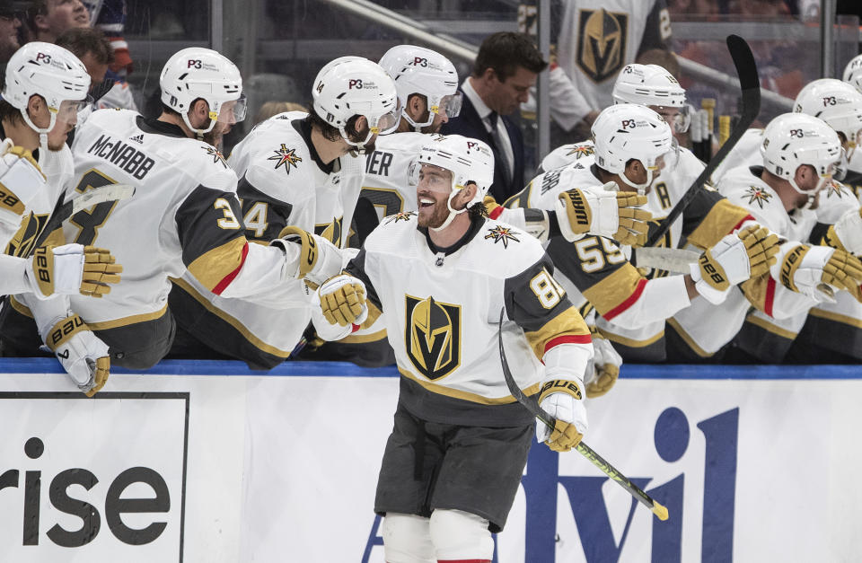 Vegas Golden Knights' Jonathan Marchessault (81) celebrates his goal against the Edmonton Oilers with teammates during the second period in Game 6 of an NHL Stanley Cup second-round playoff hockey series in Edmonton, Alberta, Sunday, May 14, 2023. (Jason Franson/The Canadian Press via AP)