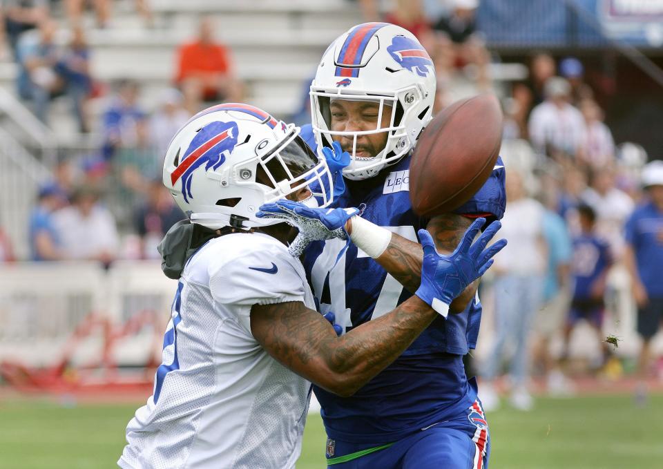 Bills receiver Deonte Harty tries to make the catch on this deep pass against defensive back Christian Benford.