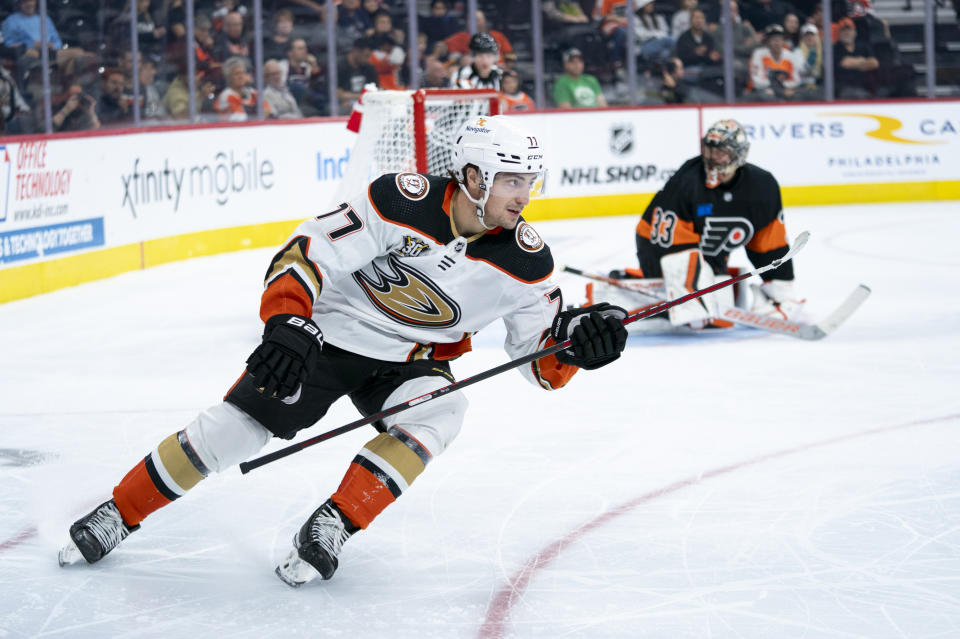 Anaheim Ducks' Frank Vatrano, left, reacts to scoring his third goal against Philadelphia Flyers' Samuel Ersson, right, during the third period of an NHL hockey game, Saturday, Oct. 28, 2023, in Philadelphia. The Ducks won 7-4. (AP Photo/Chris Szagola)