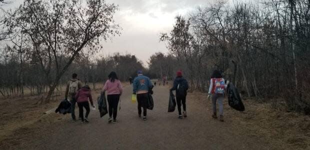 A group of close to 50 Edmontonians have started organizing together in the last couple of weeks to pick up litter around parks in and near Edmonton's river valley. (Submitted by Ryan Haworth - image credit)