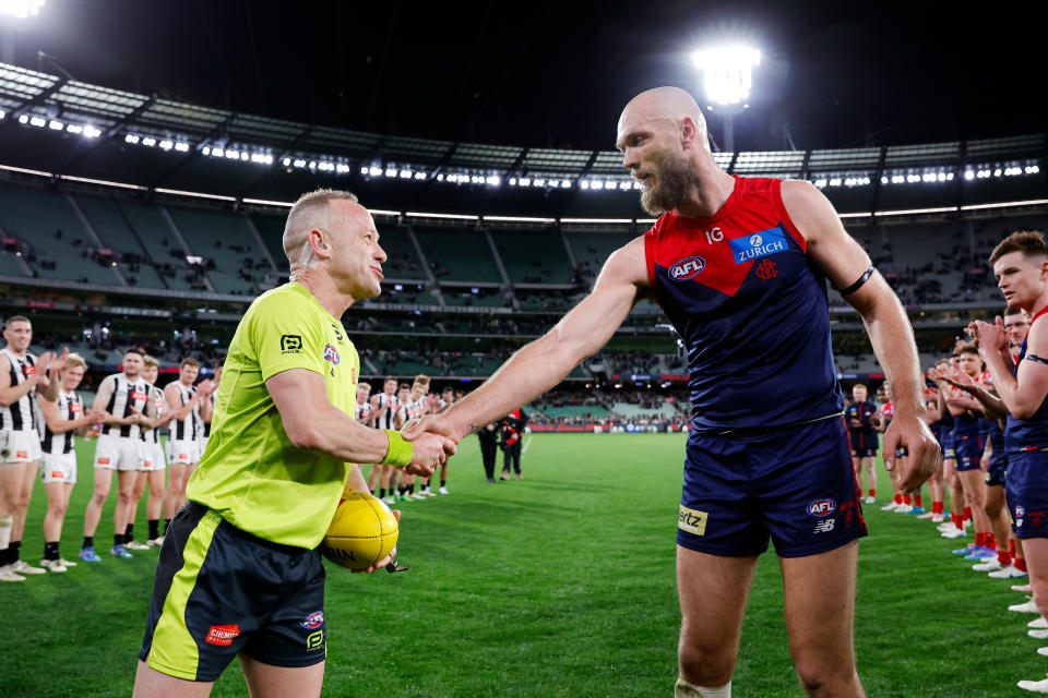 Max Gawn shakes the hand of Ray Chamberlain.