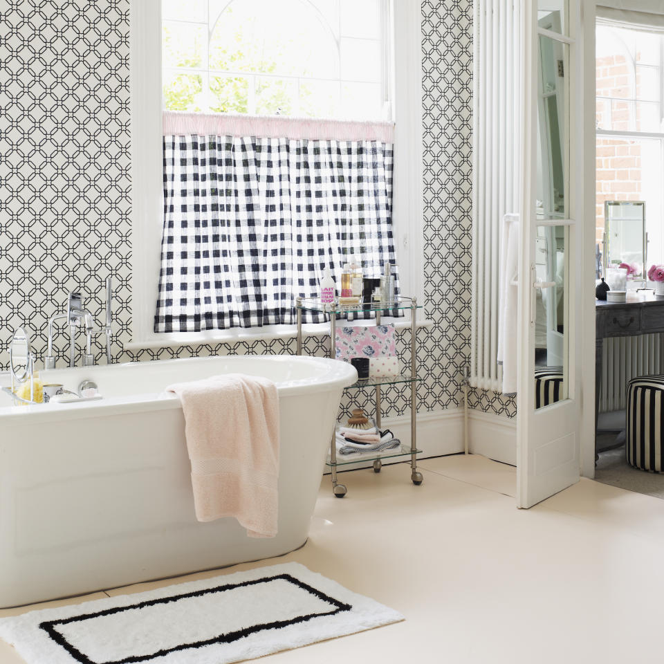 bathroom with geo black and white wallpaper