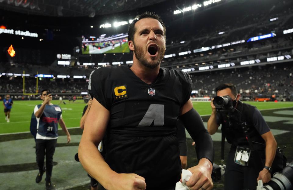 Derek Carr celebrates the Raiders' overtime victory against the Ravens at Allegiant Stadium.