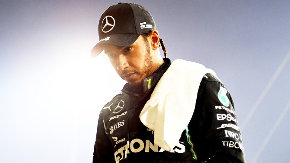 Lewis Hamilton (pictured) walking off the grid at the F1.