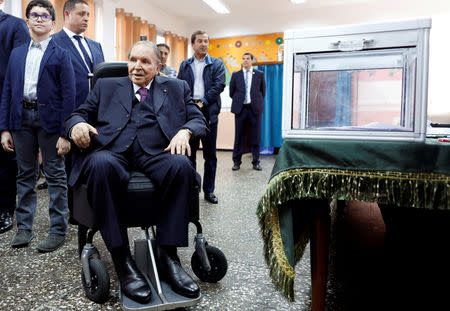 FILE PHOTO: Algeria's President Abdelaziz Bouteflika looks at journalists after casting his ballot during the parliamentary election in Algiers, Algeria, May 4, 2017. REUTERS/Zohra Bensemra/File Photo