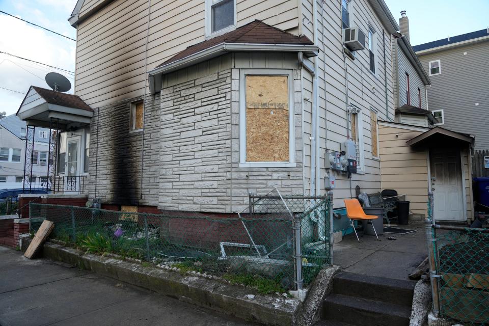 A home is boarded up after a fire at 465 Hamilton Ave in Paterson, NJ on Monday April 15, 2024.