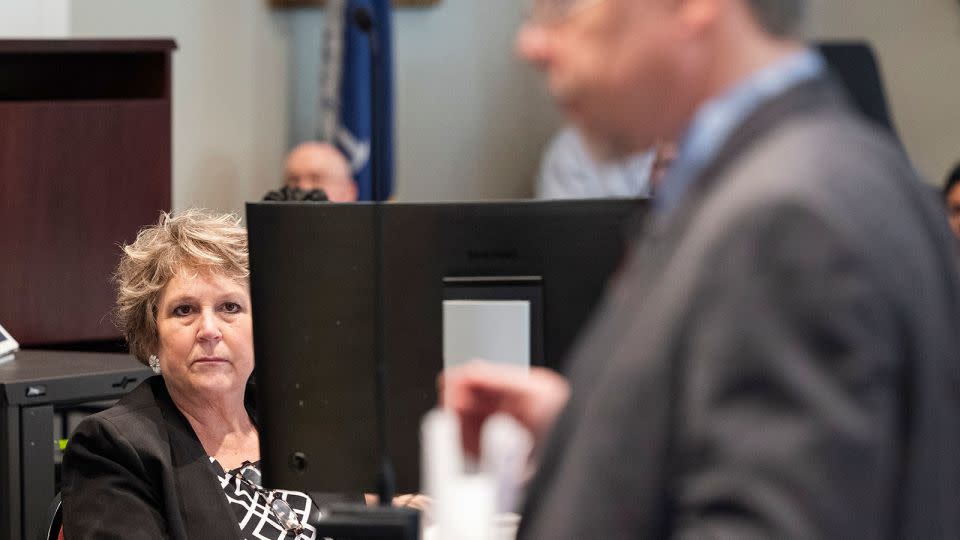 Colleton County Clerk of Court Rebecca Hill listens as prosecutor Creighton Waters makes closing arguments in Alex Murdaugh's murder trial. - Joshua Boucher/Pool/The State/AP/FILE