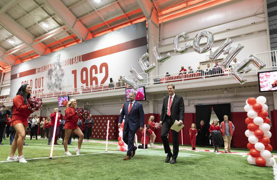 New Nebraska NCAA college football coach Matt Rhule, left, arrives with athletic director Trev Alberts for an introductory press conference, Monday, Nov. 28, 2022, in Lincoln, Neb. (AP Photo/Rebecca S. Gratz)