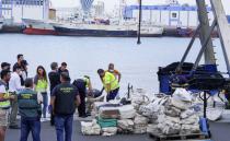 Police officers discharge drugs from the fishing boat "AKT-1", in the island of Gran Canaria