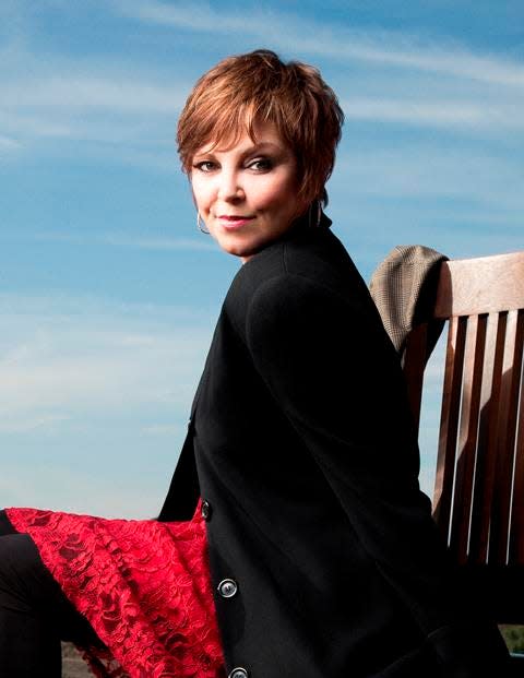 More than 40 years into her career, Pat Benatar is still standing with a defiant smile.