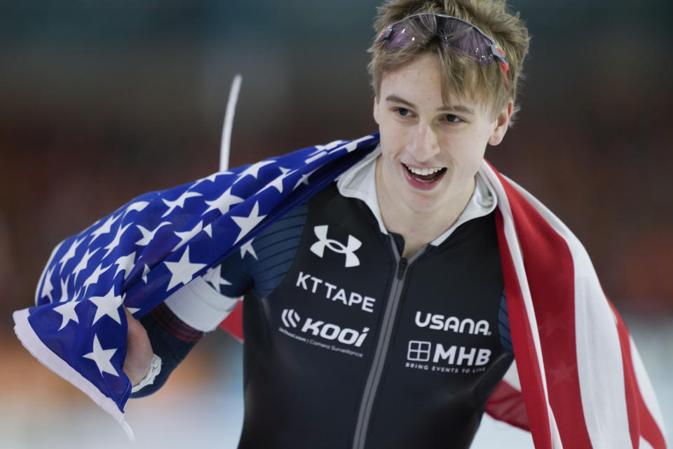 Jordan Stolz of the U.S. celebrates winning his third gold medal on the 1500m Men event of the Speedskating Single Distance World Championships at Thialf ice arena Heerenveen, Netherlands, Sunday, March 5, 2023. (AP Photo/Peter Dejong)