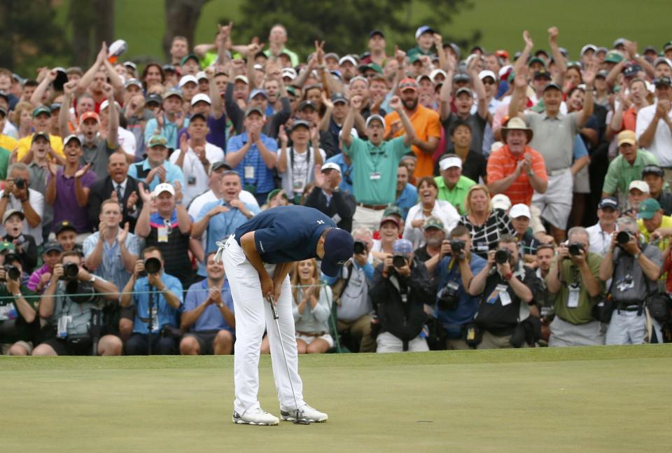 Jordan Spieth of the U.S. reacts as his putt sinks to win the Masters golf tournament at the Augusta National Golf Course in Augusta, Georgia April 12, 2015. REUTERS/Mark Blinch