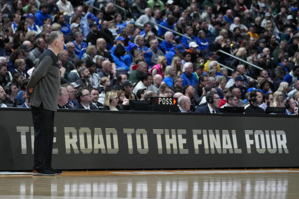 Purdue head coach Matt Painter watches as his team played against Fairleigh Dickinson in the second half of a first-round college basketball game in the men's NCAA Tournament in Columbus, Ohio, Friday, March 17, 2023. (AP Photo/Michael Conroy)