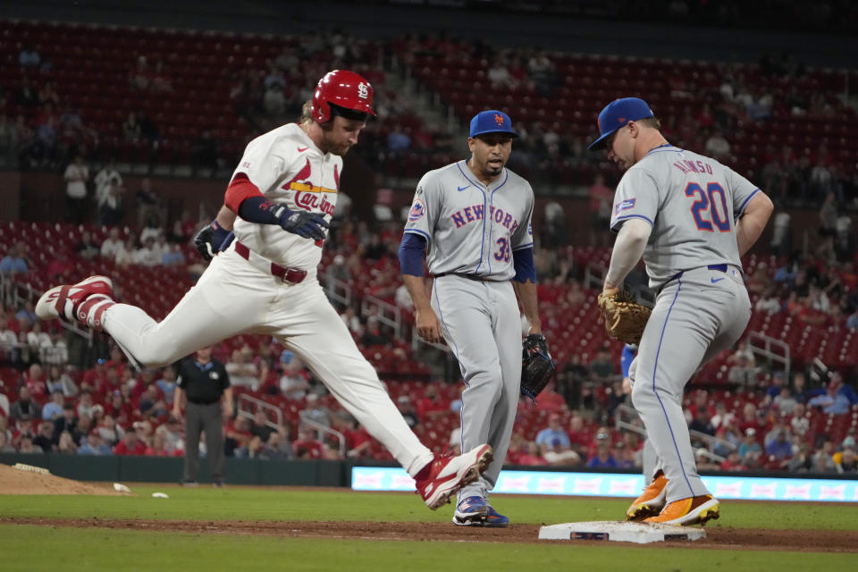 St. Louis Cardinals' Brendan Donovan, left, grounds out to New York Mets first baseman Pete Alonso (20) as Mets relief pitcher Edwin Diaz watches during the ninth inning of a baseball game Monday, May 6, 2024, in St. Louis. (AP Photo/Jeff Roberson)