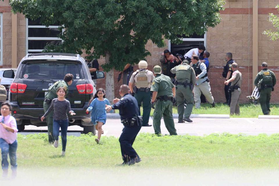 Uvalde, TX May 24, 2022 Shooting at Robb Elementary School kills 19 students and 2 teachers. Early stages outside the school. Credit: Uvalde Leader News free of charge.  Contact: Meghann Garcia: mgarcia@ulnnow.com 830 278 3335