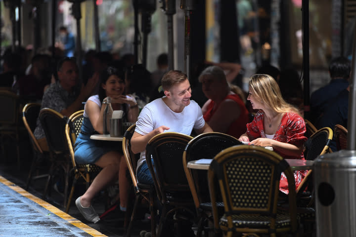 Couple seen dining outside in Melbourne.