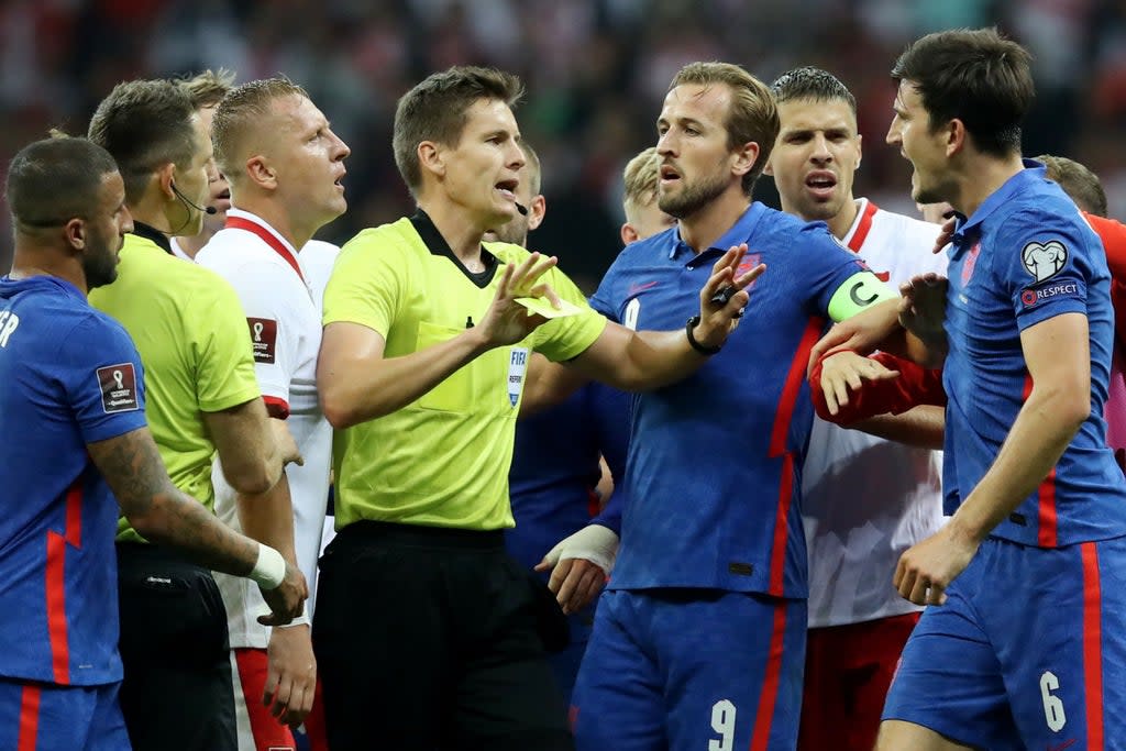 There were furious scenes after the half-time whistle between Poland and England  (REUTERS)