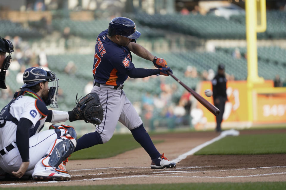 Houston Astros' Jose Altuve singles against the Detroit Tigers in the first inning of a baseball game in Detroit, Monday, Sept. 12, 2022. (AP Photo/Paul Sancya)