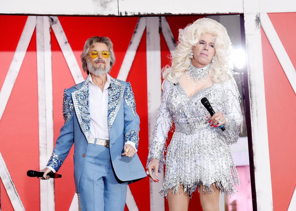 <p><strong>SAVANNAH GUTHRIE</strong> and <strong>MATT LAUER</strong>, as Kenny Rogers and Dolly Parton, at <em>The Today Show</em>'s annual Full Relinquishment of Dignity. </p>