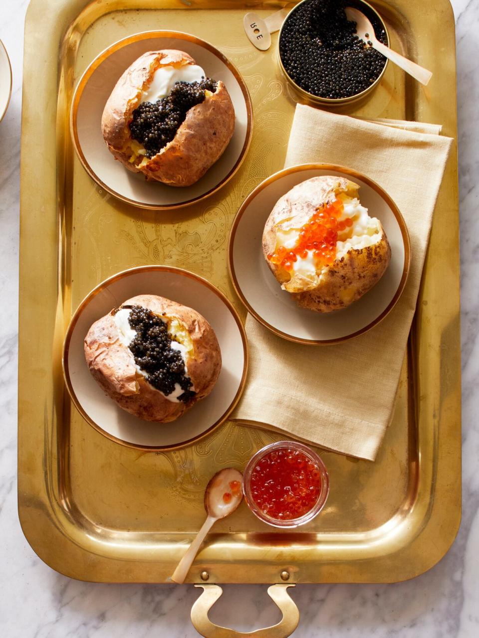 baked potatoes with crème fraîche and caviar