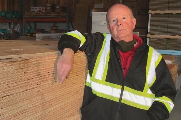 Art Hicks is the owner of Home Hardware Building Centre in Witless Bay. He's tired of giving customers bad news about how much lumber costs these days. (Zach Goudie/CBC - image credit)