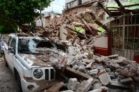 <p>The devastation in Juchitan de Zaragoza caused by the huge earthquake that hit Mexico’s Pacific coast (AFP Photo/RONALDO SCHEMIDT) </p>