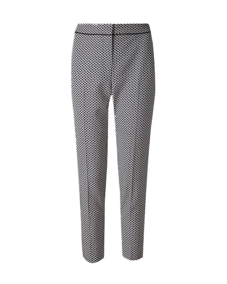 <p>Black and white trousers, £35, <a rel="nofollow noopener" href="http://www.marksandspencer.com/mono-jacquard-jacket/p/p22501219#" target="_blank" data-ylk="slk:M&S;elm:context_link;itc:0;sec:content-canvas" class="link ">M&S</a></p>